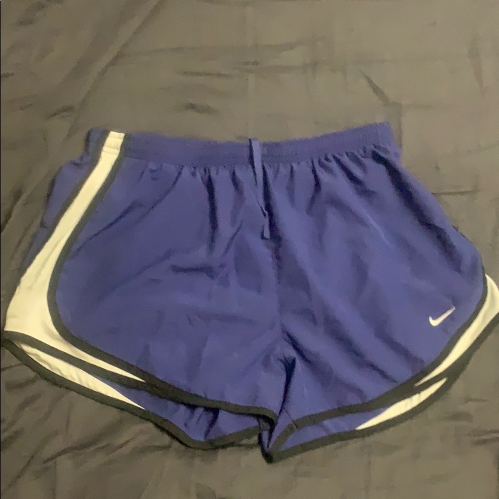 Dark ish Blue and black Nike dri fit tempo shorts